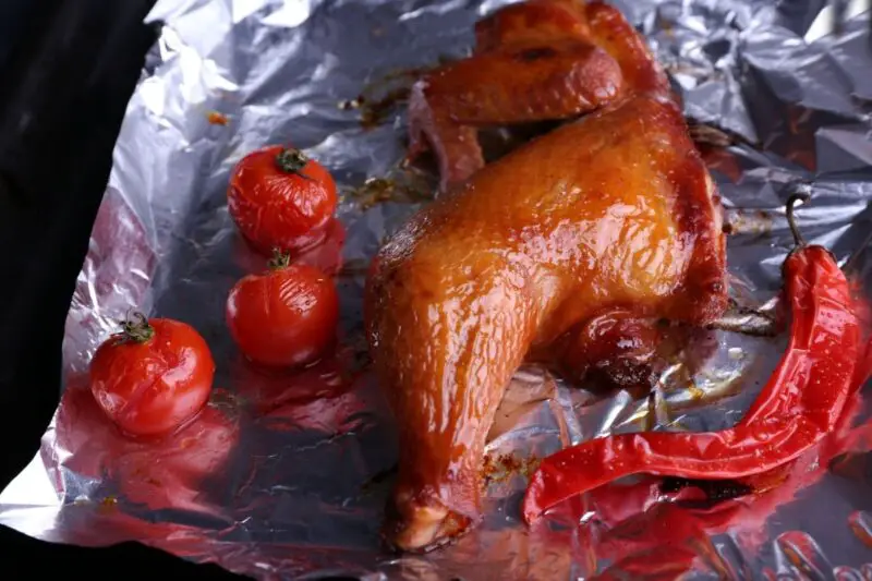 Grilled Barbecue Chicken With Vegetables In Foil